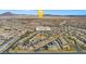 Aerial view of community and surrounding area at 6301 Beavertail Pond Ave, Las Vegas, NV 89122