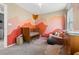 Bedroom with mountain mural and mid-century furniture at 6301 Beavertail Pond Ave, Las Vegas, NV 89122
