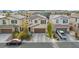 Two-story house with attached garage and landscaping at 6301 Beavertail Pond Ave, Las Vegas, NV 89122