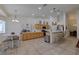 Well-lit kitchen with light wood cabinets and a breakfast bar at 6309 Kraft Ave, Las Vegas, NV 89130