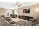 Living room with sectional sofa and dining area at 6389 Jacobville Ct, Las Vegas, NV 89122