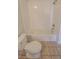 Simple bathroom with a toilet and bathtub at 68 E Serene Ave # 112, Las Vegas, NV 89123