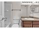 Clean bathroom with granite vanity, bathtub, and toilet at 6800 E Lake Mead Blvd # 2028, Las Vegas, NV 89156