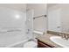 Updated bathroom featuring a tub, shower, and granite countertop at 6800 E Lake Mead Blvd # 2028, Las Vegas, NV 89156
