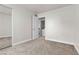Bedroom with mirrored closet and access to laundry at 6800 E Lake Mead Blvd # 2028, Las Vegas, NV 89156