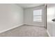 Simple bedroom with neutral wall and carpet at 6800 E Lake Mead Blvd # 2028, Las Vegas, NV 89156