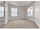 Spacious bedroom with neutral carpeting and large windows at 6800 E Lake Mead Blvd # 2028, Las Vegas, NV 89156