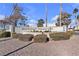 Mountainside Condominiums entrance with landscaping at 6800 E Lake Mead Blvd # 2028, Las Vegas, NV 89156