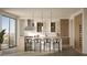 Modern kitchen with marble countertops and wood cabinets at 700 W Carson Ave # 1401, Las Vegas, NV 89106