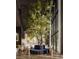 Luxury lobby with a central tree, comfortable seating, and large windows at 700 W Carson Ave # 1401, Las Vegas, NV 89106