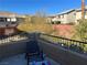 Elevated view of backyard with artificial turf and surrounding homes at 10468 Bay Ginger Ln, Las Vegas, NV 89135