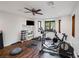 Home gym with various exercise equipment and natural light at 105 Quail Run Rd, Henderson, NV 89014