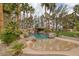 Resort-style pool with waterfall and sand play area at 105 Quail Run Rd, Henderson, NV 89014