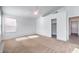 Main bedroom with carpet, ceiling fan, and a walk-in closet at 1183 Winnipeg Ct, Henderson, NV 89002