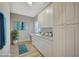 Bright laundry room with white cabinets and workspace at 1894 Wallingford St, Henderson, NV 89052