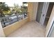 Outdoor balcony with neutral tile flooring and a view of the landscape at 270 E Flamingo Rd # 211, Las Vegas, NV 89169