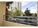 Enjoy gorgeous views from the condo's balcony, overlooking the surrounding greenery and buildings at 270 E Flamingo Rd # 211, Las Vegas, NV 89169
