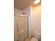 Clean bathroom with a modern shower featuring a sliding glass door and neutral walls at 270 E Flamingo Rd # 211, Las Vegas, NV 89169