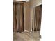 Bedroom with mirrored closet doors and carpeting at 270 E Flamingo Rd # 211, Las Vegas, NV 89169