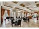 Stylish common area with high ceilings, comfortable seating, a grand piano, and ample natural light at 270 E Flamingo Rd # 211, Las Vegas, NV 89169