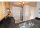 Charming kitchen featuring stainless appliances, granite countertops, and natural wood cabinets at 270 E Flamingo Rd # 211, Las Vegas, NV 89169