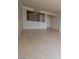 Bright living room features neutral paint, and sleek tile flooring plus a bar area at 270 E Flamingo Rd # 211, Las Vegas, NV 89169