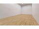 Well-lit racquetball court featuring hardwood floors and clean white walls at 270 E Flamingo Rd # 211, Las Vegas, NV 89169