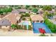 A backyard aerial view featuring a swimming pool, spa, and sport court at 2730 El Camino Rd, Las Vegas, NV 89146