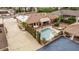 An aerial view of the backyard featuring a swimming pool, spa, and landscaping at 2730 El Camino Rd, Las Vegas, NV 89146