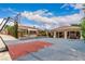 Large basketball court next to covered patio, creating a versatile outdoor entertainment space at 2730 El Camino Rd, Las Vegas, NV 89146