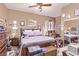 Bedroom with wood furnishings, framed pictures and a soft color scheme at 2730 El Camino Rd, Las Vegas, NV 89146