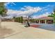 Long driveway with basketball court and partial house view at 2730 El Camino Rd, Las Vegas, NV 89146