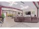 Spacious garage featuring a large seating area, classic car, and ample room for vehicles or hobbies at 2730 El Camino Rd, Las Vegas, NV 89146