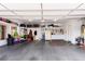 Spacious garage offers ample storage, built-in shelving, and plenty of room for vehicles and projects at 2730 El Camino Rd, Las Vegas, NV 89146