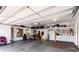 This garage offers shelving for storage and plenty of room to park vehicles at 2730 El Camino Rd, Las Vegas, NV 89146