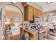 Cozy kitchen featuring wooden cabinetry and stainless steel appliances at 2730 El Camino Rd, Las Vegas, NV 89146