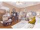 Inviting living room featuring hardwood floors, large TV, and cozy seating at 2730 El Camino Rd, Las Vegas, NV 89146
