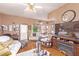 Cozy living room with hardwood floors, fireplace, and comfortable seating at 2730 El Camino Rd, Las Vegas, NV 89146