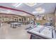 Large recreation room with gym equipment, pool table, air hockey, and ping pong tables at 2730 El Camino Rd, Las Vegas, NV 89146