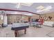 Recreation room with pool table, ping pong table, and exercise equipment at 2730 El Camino Rd, Las Vegas, NV 89146
