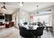 Casual dining area with a round table and black leather chairs near the kitchen at 3012 Anna Bay Dr, Las Vegas, NV 89134