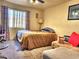 Bedroom with double bed and sitting area at 3318 N Decatur Blvd # 2068, Las Vegas, NV 89130