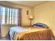 Bright bedroom with double bed and window at 3318 N Decatur Blvd # 2068, Las Vegas, NV 89130