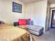 Bedroom with chaise lounge and window at 3318 N Decatur Blvd # 2068, Las Vegas, NV 89130
