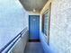 Building entryway with blue door and neutral colored walls at 3318 N Decatur Blvd # 2068, Las Vegas, NV 89130
