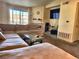 Spacious living room with comfortable seating and fireplace at 3318 N Decatur Blvd # 2068, Las Vegas, NV 89130