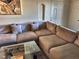 Living room with large sectional sofa and coffee table at 3318 N Decatur Blvd # 2068, Las Vegas, NV 89130