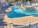 Community pool and spa with lounge chairs at 3318 N Decatur Blvd # 2068, Las Vegas, NV 89130