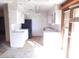Kitchen with white cabinets and black appliances at 3748 Skyline St, Logandale, NV 89021