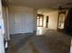 Living room with tiled floors and a wood burning stove at 3748 Skyline St, Logandale, NV 89021
